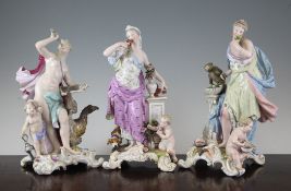 Three Meissen groups of maidens emblematic of the senses, 19th century, the figure of Sight holding