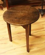 A George III circular oak cricket table, on chamfered legs, W.1ft 11in.