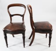 A set of eight Victorian mahogany balloon back dining chairs, with over stuffed brown leather seats