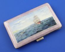 A 1920`s continental silver and enamel cigarette case, the lid with shipping scene after