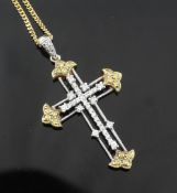 A two colour 18ct gold and diamond set cross pendant, on an 18ct gold fine link chain, pendant 1.