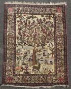 An Isphahan Tree of Life Paradise Garden rug, on an ivory ground, with three row border, 6ft 3in by