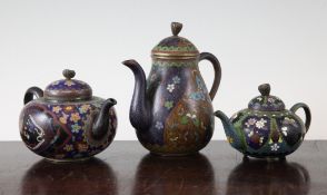 Three Japanese cloisonne enamel teapots, early 20th century, the first of pear shape decorated with