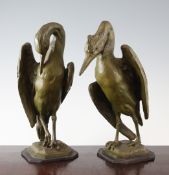 Charles Valton (1851-1918). A pair of patinated bronze egrets, on octagonal bases, signed, 12.75in.