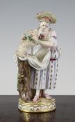 A Meissen group of a lady and a sheep, 19th century, she tying a bow around the sheep`s neck,