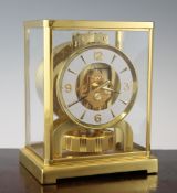 A Jaeger Le Coultre gilt brass Atmos clock, with arabic / baton numeral dial, no.395919, 9in., with