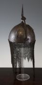 An Indo Persian engraved steel and koftgari khula khud, with spike finial and chain mail neck