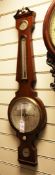 A Regency rosewood wheel barometer, with hygrometer, thermometer, dial and level signed J.