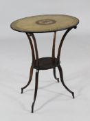 An Edwardian oval two tier occasional table, with floral decorated top and splayed legs, W.1ft
