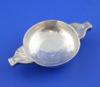 A late 17th/early 18th century Scottish provincial? silver quaich, with two lug handles, engraved