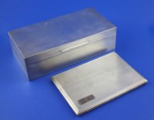 A late 1960`s engine turned silver rectangular cigarette case by Asprey & Co, with interior