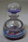 A millefleur glass inkwell paperweight, early 20th century, the base with six concentric rings of