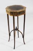 An Edwardian mahogany and satinwood octagonal top occasional table, with floral painted decoration,