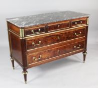 A 19th century French mahogany and marble top commode, with three long drawers, brass mounted