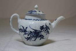 A Worcester `Feather Moulded` pattern teapot, c.1756-60, painted underglaze blue floral motif