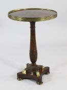 A French Empire mahogany and ormolu mounted gueridon, by Alexandre Maigret, the circular top with