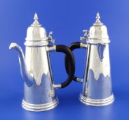 A 1960`s Queen Anne design Britannia standard cafe au lait pair, with turned finials and scroll