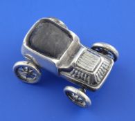 An Edwardian novelty silver pin cushion modelled as a veteran car, Levi & Salaman, Birmingham,