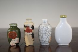 Four Chinese porcelain snuff bottles, 1800-1900, the first white glazed of flattened form, 6.9cm.,