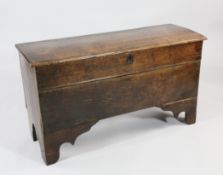 An 18th century oak six plank coffer, with internal candle box and shaped bracket feet, W.3ft 6in.