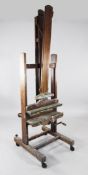 A late 19th century Robertson & Co mahogany studio easel, with ivorine maker`s plaque inscribed C.