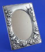 A late 19th/early 20th century Chinese planished silver mounted photograph frame by Wang Hing, Hong