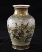 A Japanese Satsuma pottery baluster vase, by Kinkozan, early 20th century, painted with a festival