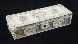 A Chinese export ivory rectangular box and cover, 19th century, with shaped reserves of figures