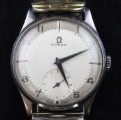 A gentleman`s 1950`s stainless steel Omega manual wind wrist watch, with baton and Arabic numerals