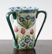 A Moorcroft Macintyre Florian `Tulip and Forget-Me-Not` three handled vase, c. 1908, inscribed mark