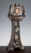 A large Bretby Arts & Crafts pottery longcase timepiece, c.1908, the Art Nouveau brown pottery case