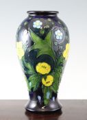 A Moorcroft Buttercup baluster vase, c.1992, impressed marks and inscribed WM mark, 10.25in.