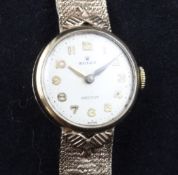 A lady`s early 1960`s 9ct gold Rolex precision manual wind wrist watch, with Arabic dial, on