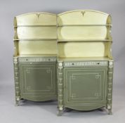 A decorative pair of Regency style green and cream painted bookcases, each with fitted shelves,