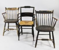 A pair of late 19th / early 20th century American stick back armchairs with traces of original