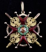 An enamelled 56 zolotnik gold Order of St Stanislas Second Class with swords, breast badge, top to