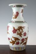 A Chinese famille rose baluster vase, 19th century, painted with pink flowers and brown foliage