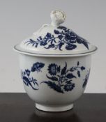 A Worcester `Three Flowers` pattern sucrier and cover, c.1770, printed in underglaze blue, the