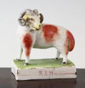 A rare and early Walton pearlware figure of a ram, c.1810, with ochre markings, on a titled