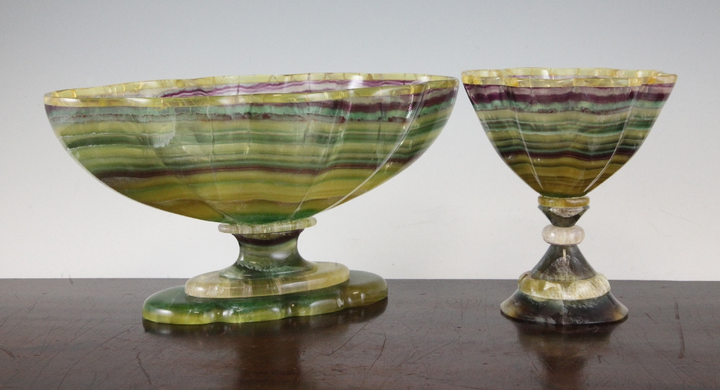 A banded fluorite pedestal bowl, of serpentine shape together with one other similar banded