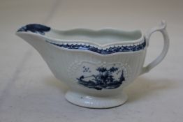 A Worcester `Little Fisherman` pattern sauceboat, c.1760, painted in underglaze blue with fisherman