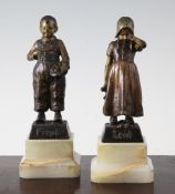 Joseph D`Aste. A pair of patinated bronze figures of a boy and girl, `Freud and Leid`, both with a