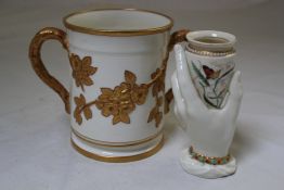 A Royal Worcester Hadley`s hand vase and a two handled loving cup, late 19th century, the Hadley`s