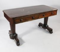 A William IV rosewood library table, fitted two frieze drawers opposing two dummy drawers with bun