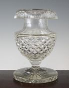 A heavy cut glass roll over rim vase, 19th century, with hobnail cut body on a thick star-cut foot,