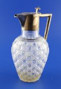 A late Victorian silver mounted hobnail cut glass claret jug, of baluster form, with angular