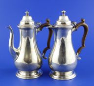 A late Victorian silver cafe au lait pair, of baluster form, Goldsmiths & Silversmiths Co, London,