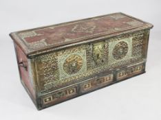 A late 19th / early 20th century brass mounted zanzibar chest, with hinged lid and large pierced