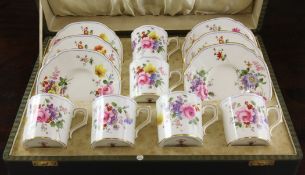 A cased Royal Crown Derby Posies pattern coffee set, each piece decorated with bouquets of flowers,