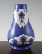 A Moorcroft Forget-Me-Not Panel powder blue vase, c.1915, of double gourd shape, inscribed W